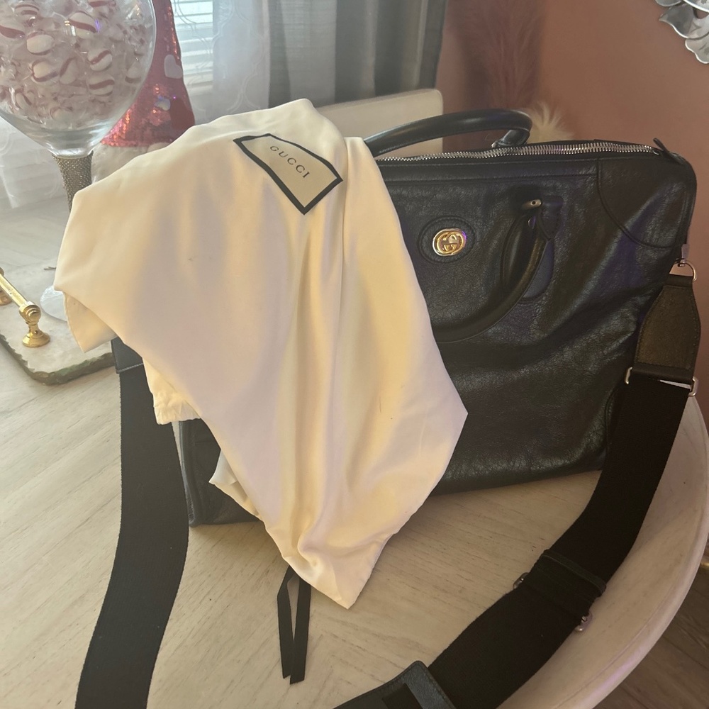Black leather Gucci duffel bag